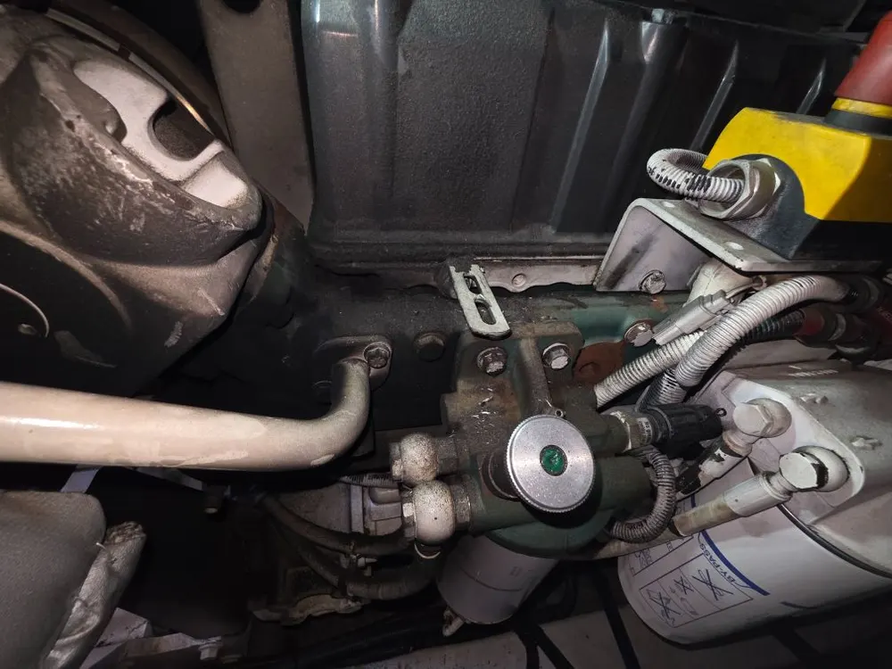 Layer of soot built up in the engine room from an exhaust leak